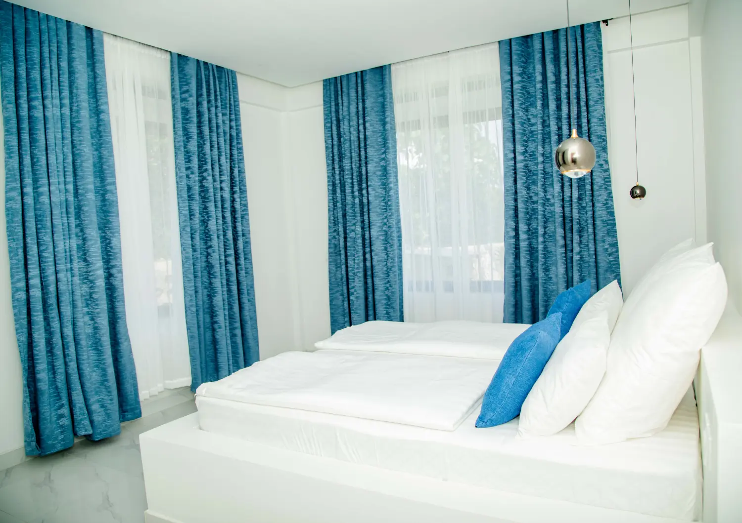 SMILE Apartments – Schlafzimmer